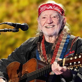 US musician Willie Nelson performs on stage during the Farm Aid Music Festival at the Coastal Credit Union Music Park in Raleigh, North Carolina, on September 24, 2022. (Photo by SUZANNE CORDEIRO / AFP) (Photo by SUZANNE CORDEIRO/AFP via Getty Images)